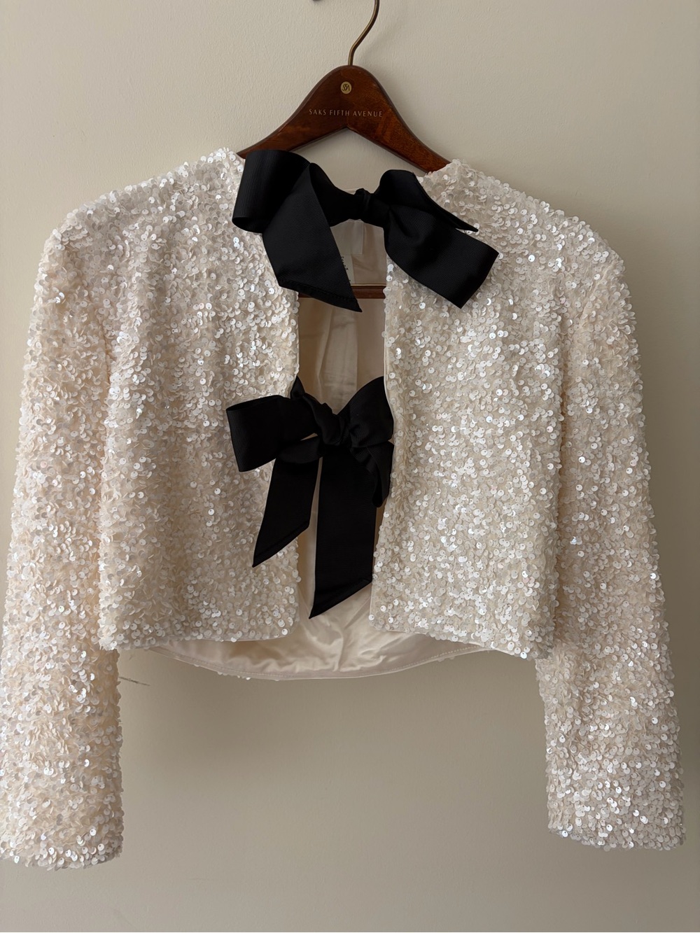 H&M Cream Sequin Cropped Bomber Jacket with Black Ribbon Bows